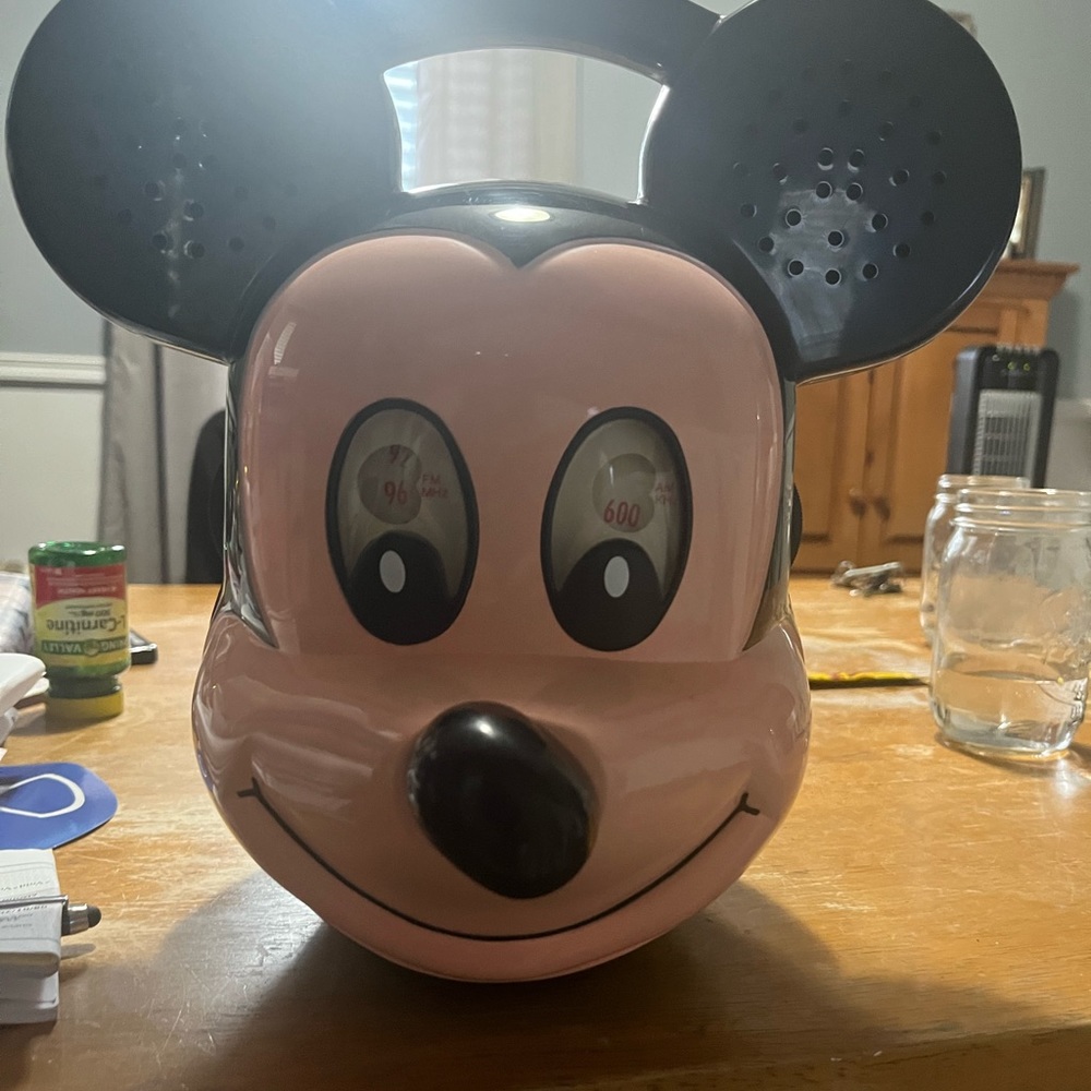 Mickey Mouse head radio.  Never used. Has a few scratches. Look at pictures
